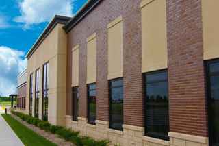 Side view and close up of brick detail on Twin Cities Orthopedics office