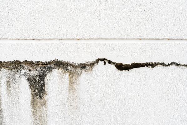 a large crack formed in a concrete wall