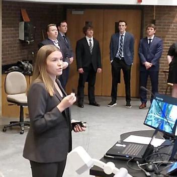 photo of Molly Hill, project manager, during a presentation