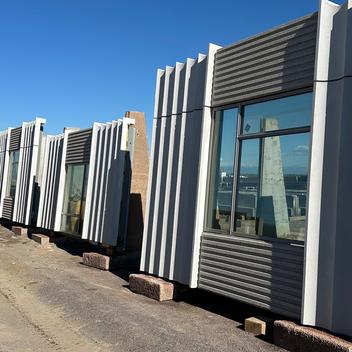 confidential office infinite facade panels in the yard