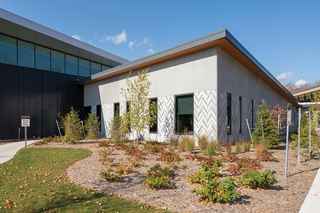 photo of the imprinted feather design on the side of the community center