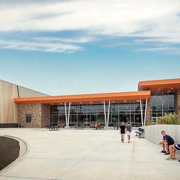 wide view of school entrance with kids