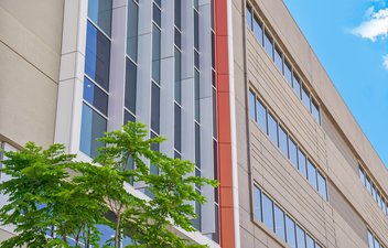 total precast building with tree in front