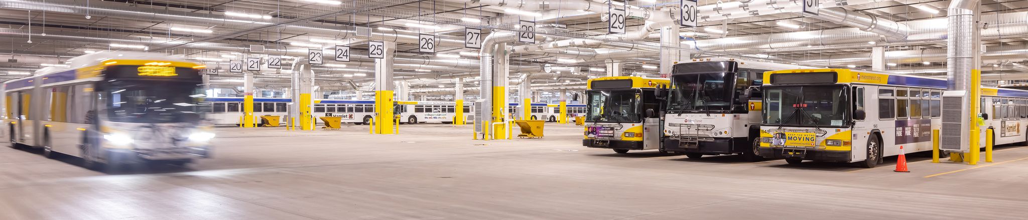 interior of minneapolis bus garage with buses