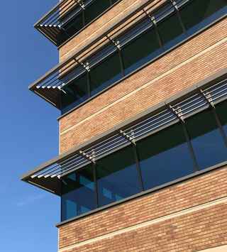 thin brick on exterior of ball corp