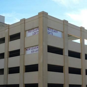 Wide shot of Prtizlaff Parking structure against a blue sky