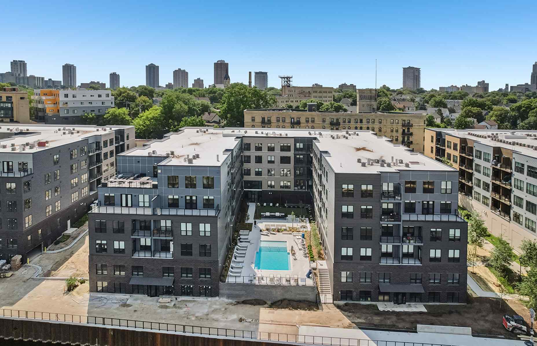 one building with pool from the river