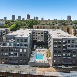 River-House-Apartments_Milwaukee_River-View-Pool-Aerial_MR