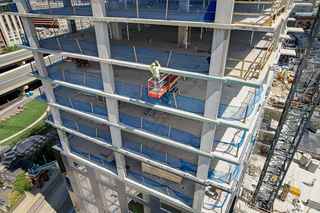 333 water street worker applying air barrier