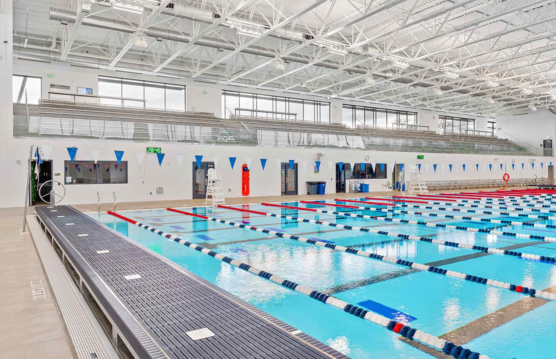 ground view of pool and lockers