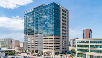 distance view of Colorado Center Tower III in Denver, a high-rise building that utilizes total precast for its structural and architectural exterior
