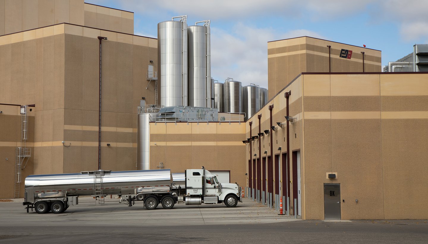 fda food processing facility with truck parked at dock