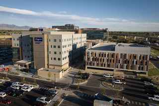 aerial of medical office building exterior with parking garage