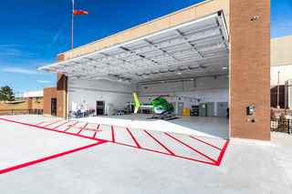 closeup of open garage and helicopter at NSMC heliport