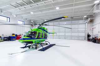interior view of NSMC heliport garage with helicopter