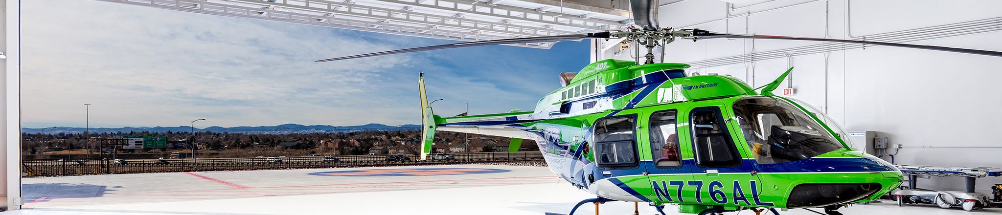 photo of helicopter in a heliport garage