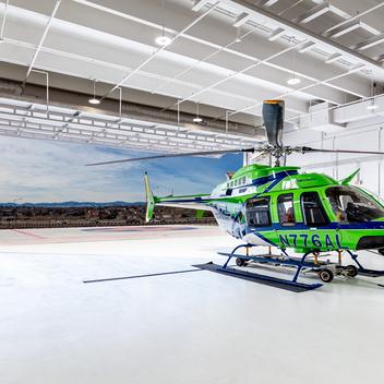 photo of helicopter in a heliport garage