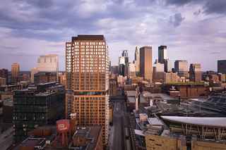 aerial of north loop green with city skyline