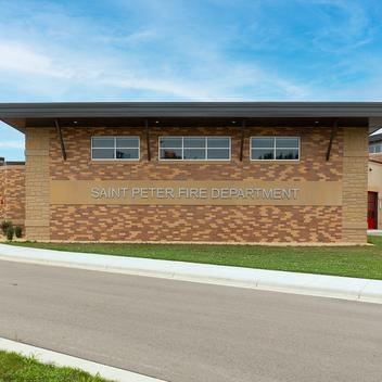 exterior of st peter fire station with truck bays