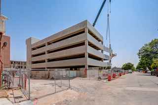 street view of thriveon parking garage during construction