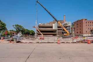 street view image of thriveon parking garage during construction