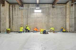 sealants team working on the floor waterproofing