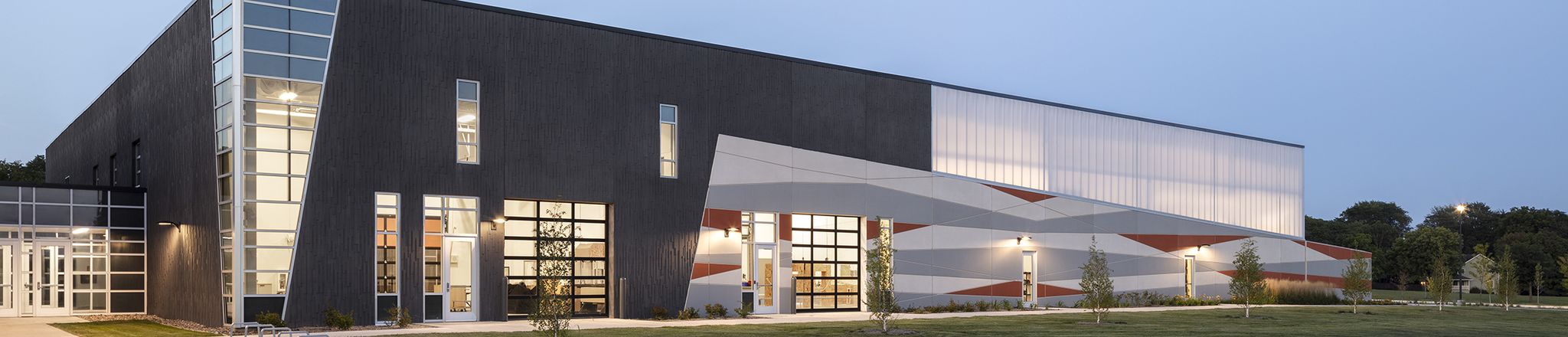 angled view of valley southwoods freshman high school CTE addition at dusk