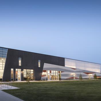 exterior of valley southwoods freshman high school CTE addition at night