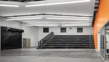 interior of valley southwoods freshman high school storm shelter with safety garage doors closed